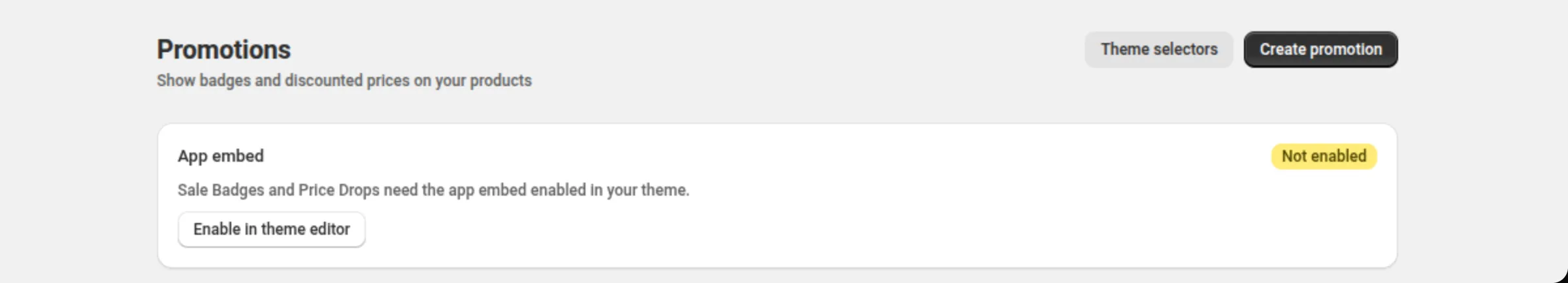 The Promotions page header with the App embed card reading Not enabled and its Enable in theme editor button